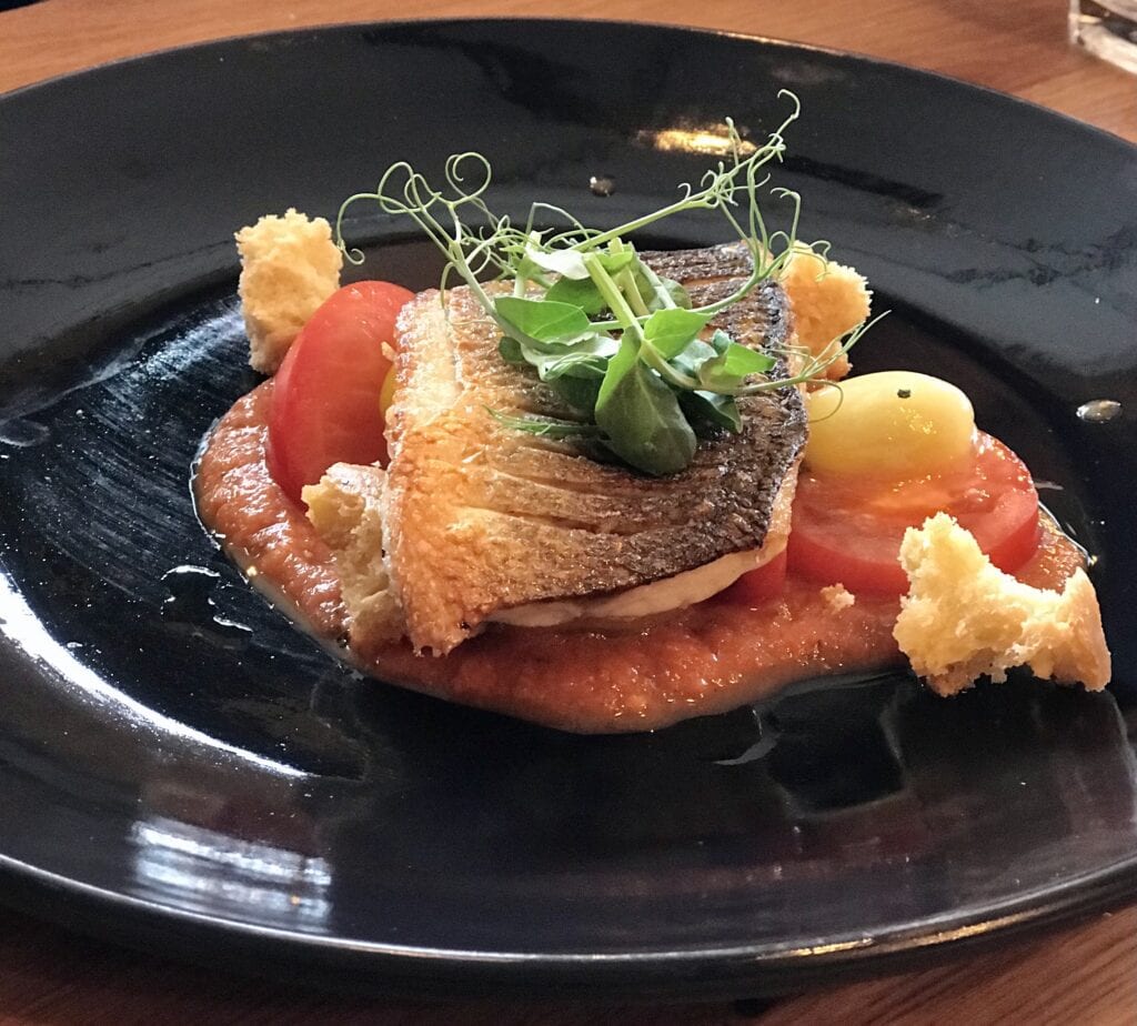 the yard roasted seabass heritage tomato panzanella salad