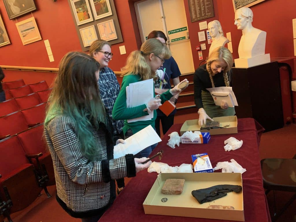 mob exhibition chester students with everyday historical objects at the grosvenor museum